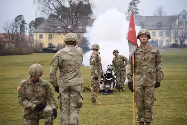 U.S. Army soldiers from the Field Artillery Squadron, 2nd Calvary Regiment, 7th Army Training Command pay respects to the late President George H. W. Bush with 