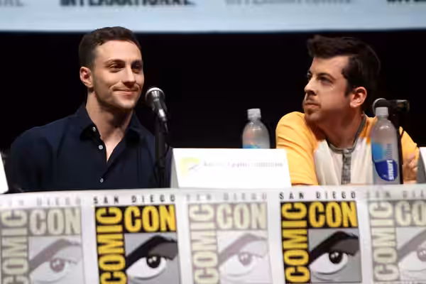 Aaron Taylor-Johnson and Christopher Mintz-Plasse speaking at the 2013 San Diego Comic Con International, for "Kick-Ass 2", at the San Diego Convention Center i