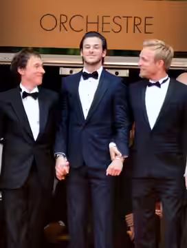 Bertrand Bonello, Gaspard Ulliel et Jérémie Renier lors de la présentation de "Saint-Laurent" au festival de Cannes (2014)