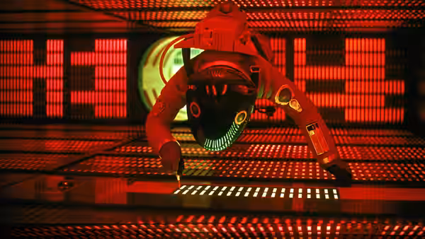 An astronaut in a red spacesuit working inside a room illuminated by red lights