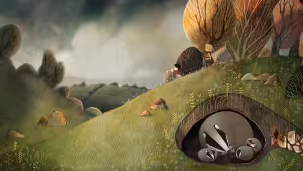Two children on a grassy hill peering into an underground burrow