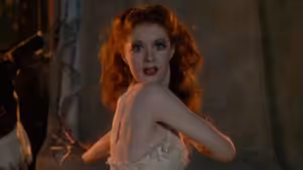 Victoria Page (Moira Shearer) looking back over her shoulder with wide eyes