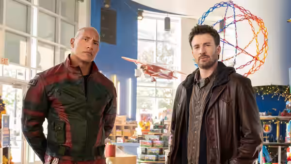 Callum Drift (Dwayne Johnson) and Jack O'Malley (Chris Evans) inside a toy store