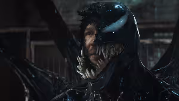 Eddie Brock (Tom Hardy) with Venom symbiote around his face