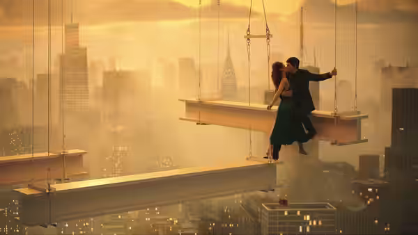 Couple balances on a suspended beam high above a hazy city skyline