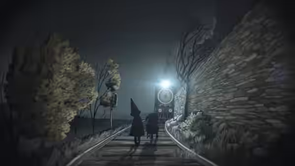 Wirt and Gregory walk toward a train on tracks at night