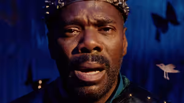 John 'Divine G' Whitfield (Colman Domingo) in a jeweled crown speaks intensely