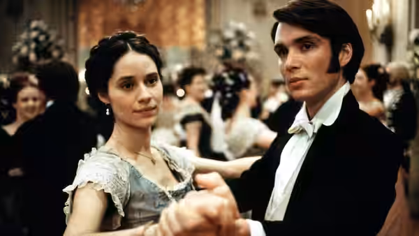 Paul Montague (Cillian Murphy) dances with Hetta Carbury at a formal ball