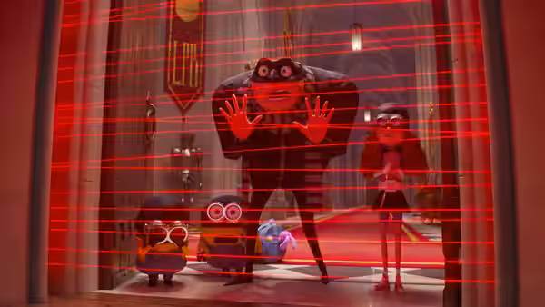 A masked figure presses against red laser beams with minions and a girl