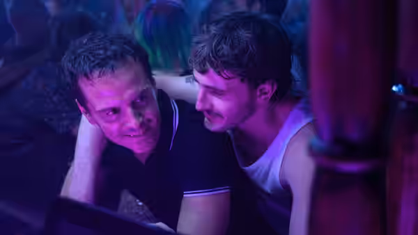 Adam (Andrew Scott) with arm around Harry (Paul Mescal) in a nightclub