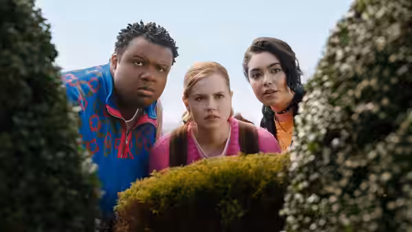 Damian Hubbard (Jaquel Spivey) and two friends peer over bushes