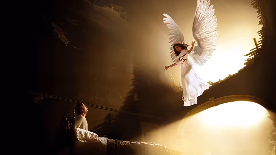 a winged angel with a violin flies above a man lying in bed