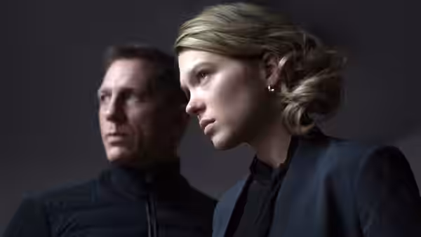 James Bond (Daniel Craig) and Madeleine (Léa Seydoux) looking to the side