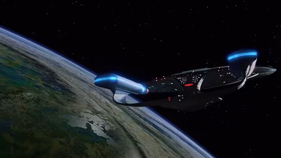 a starship with glowing blue engines flying above a green planet