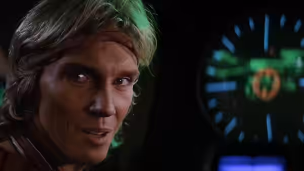 Khan (Ricardo Montalban) at the controls with green display behind him