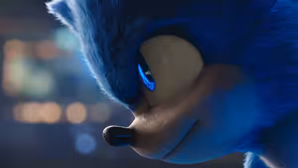 Sonic (Ben Schwartz) in close-up gazing to the side