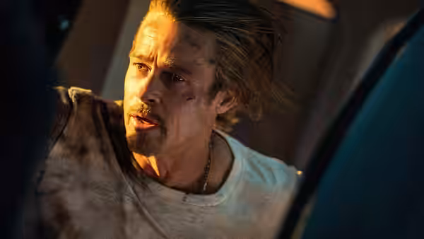 Ladybug (Brad Pitt) with facial injuries inside a vehicle at night