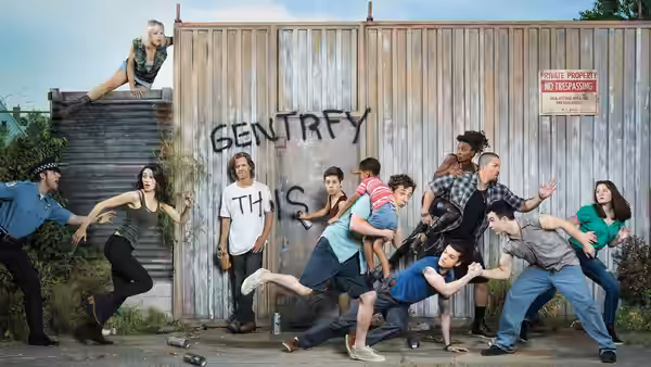 Group of young adults striking action poses in front of a wooden fence