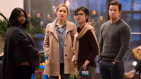 Karen (Octavia Spencer), Ellie (Rose Byrne), Sharon (Tig Notaro) and Pete (Mark Wahlberg) standing together indoors