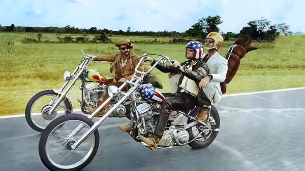Billy (Dennis Hopper) and Wyatt (Peter Fonda) ride their motorcycles along a country road