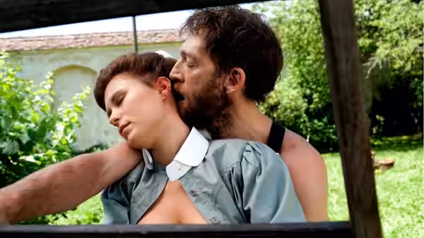 Carl Jung (Michael Fassbender) and Otto Gross (Vincent Cassel) embrace in a garden
