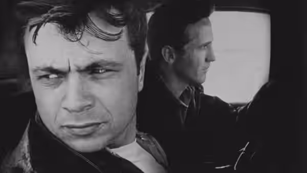 Perry Smith (Robert Blake) rides beside Richard Hickock (Scott Wilson), who drives