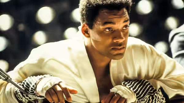 Muhammad Ali (Will Smith) leans on the ropes in his boxing robe