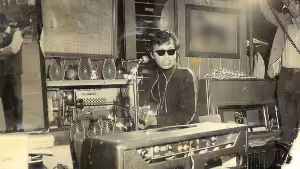 Rodriguez (Rodriguez) seated at a mixing console in a recording studio