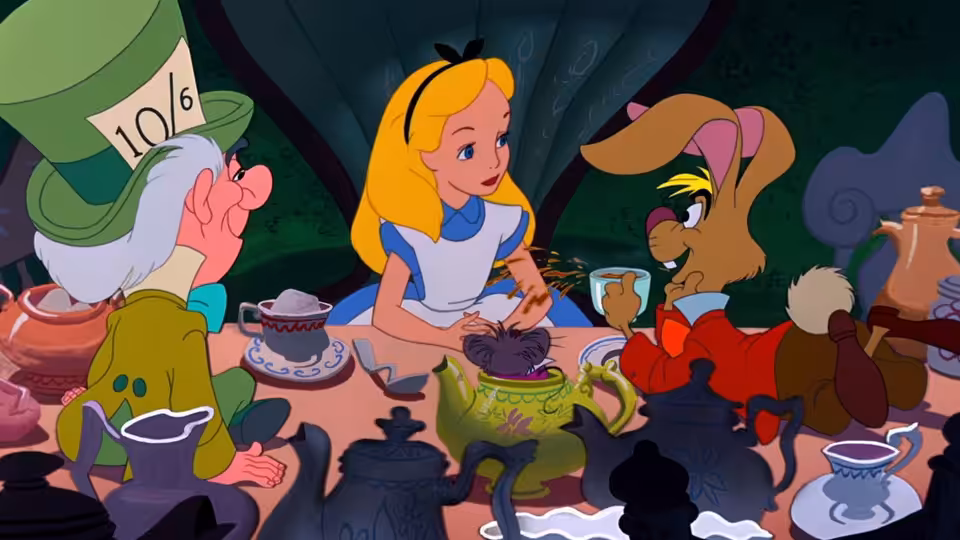 Alice, the Mad Hatter and the March Hare having tea together