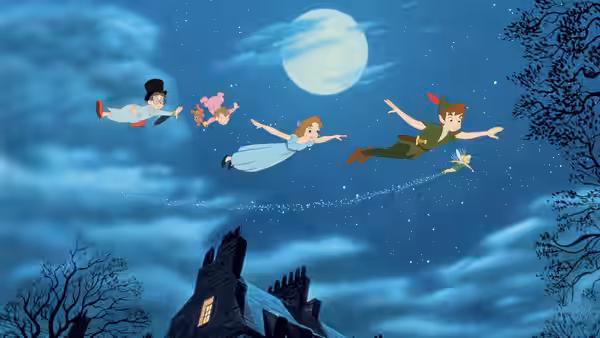 Peter Pan (Bobby Driscoll) flies with Wendy (Kathryn Beaumont) and brothers over moonlit house