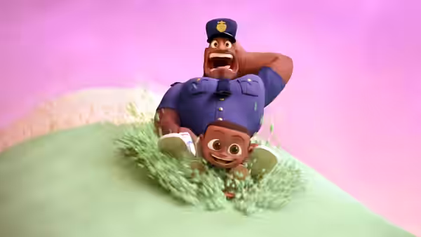 Earl Devereaux and Cal slide together down a grassy hill beneath a pink sky