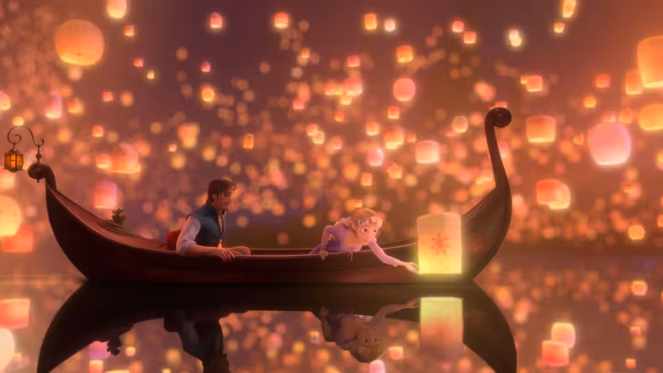 Rapunzel (Mandy Moore) and Flynn Rider (Zachary Levi) in a lantern-lit boat