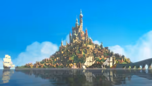 Castle on an island with ships under a clear blue sky