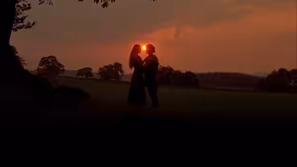 Westley (Cary Elwes) and Buttercup (Robin Wright) kiss in silhouette at sunset
