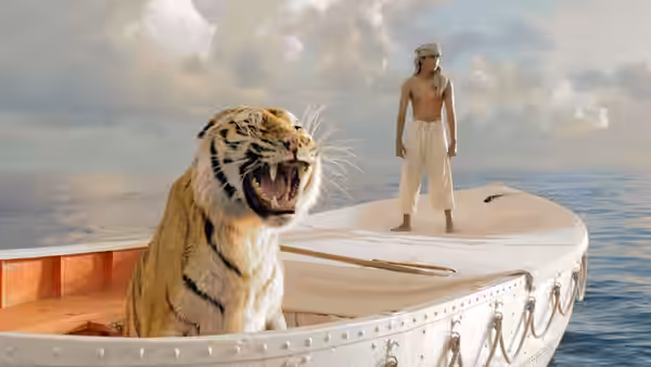 Tiger roars from lifeboat as man stands watching on open sea