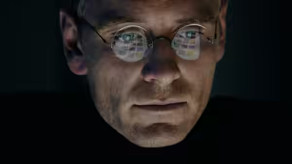 Steve Jobs (Michael Fassbender) with screen data reflected in his glasses