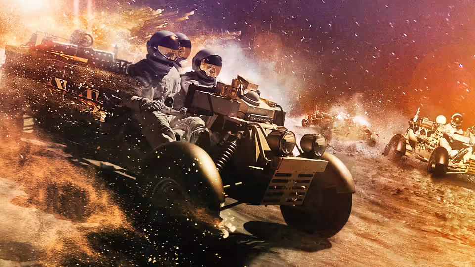 Two figures in protective suits ride a vehicle through a fiery desert with explosions