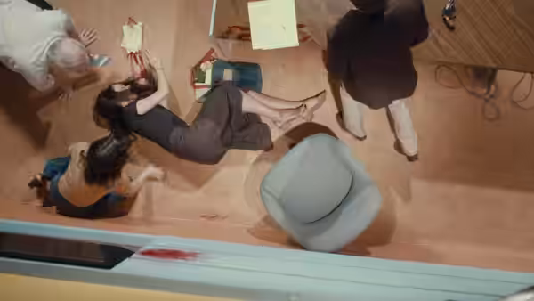 Christine Chubbuck (Rebecca Hall) lying on the floor after collapse