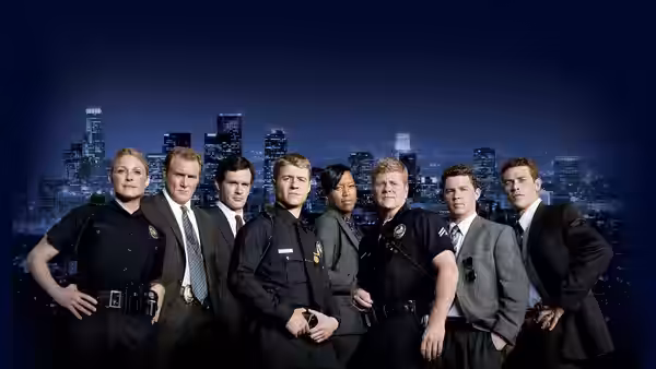A team of police officers and detectives standing together against a nighttime city skyline