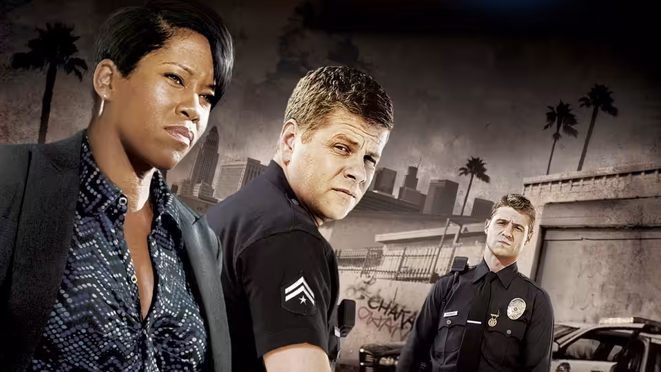 Three law enforcement officers posing in front of a cityscape with palm trees