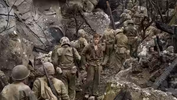 Group of soldiers moving through a rocky destroyed battlefield area