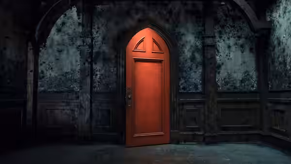 A red door stands in a dark decaying arched room