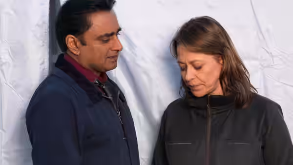 DS Sunny Khan (Sanjeev Bhaskar) and DCI Cassie Stuart (Nicola Walker) facing each other closely