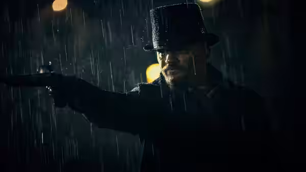James Keziah Delaney (Tom Hardy) aiming a pistol in heavy rain