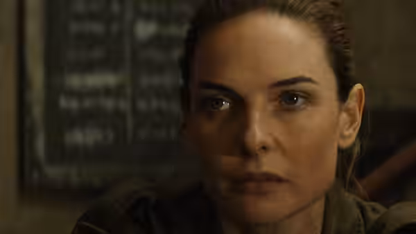 Juliette Nichols (Rebecca Ferguson) gazing forward with a serious expression