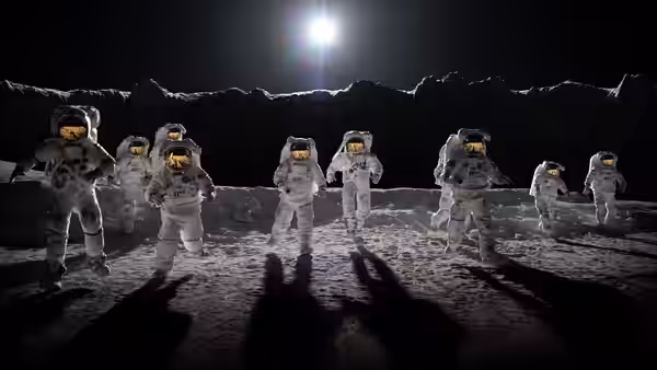 Group of astronauts walks across lunar surface under bright light