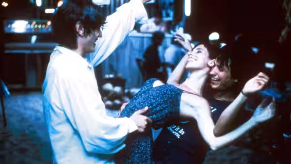 Luisa (Maribel Verdú) lifted and spun by Tenoch and Julio