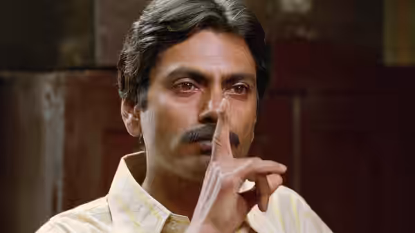Sardar Khan (Manoj Bajpai) pressing a finger to his nose