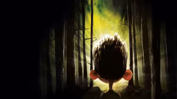 Norman Babcock (Kodi Smit-McPhee) faces a bright light in a dark forest