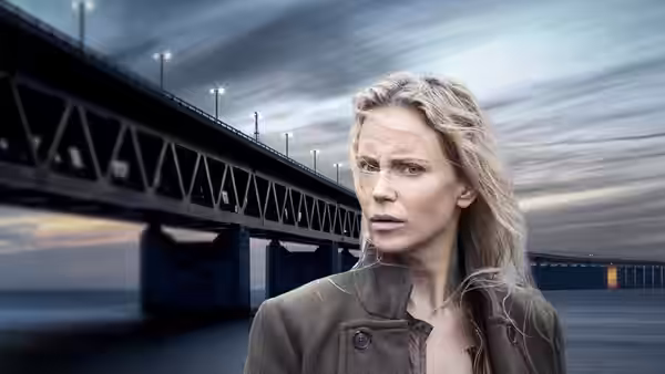 Saga Norén (Sofia Helin) stands before a large bridge over water with a serious expression